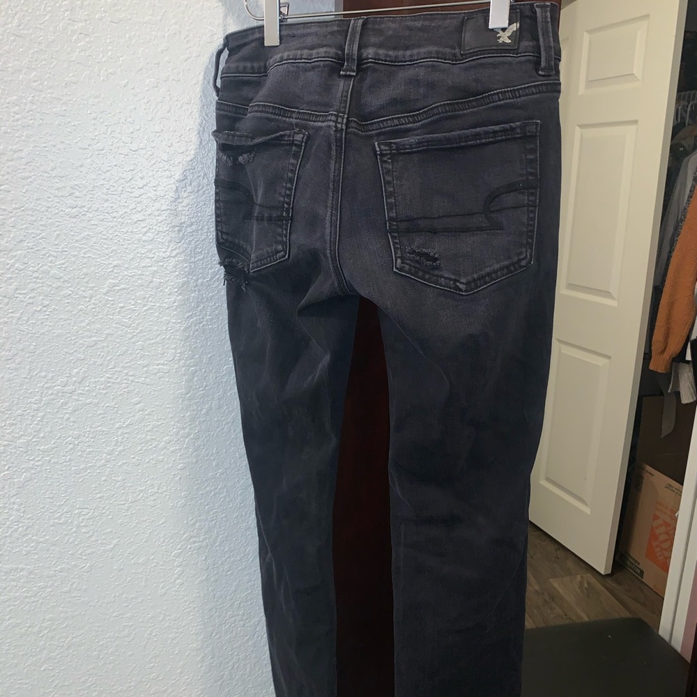 AEO black distressed super stretch jeans